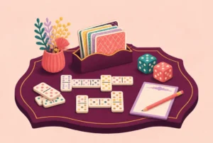 Oversized dominoes, two large dice, cards in a holder and a scorepad on a card table