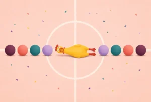 Foam balls lined up on a gym center line with a rubber chicken in the middle